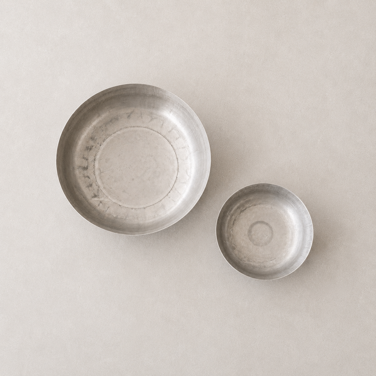 HAND-FINISHED METAL BOWL